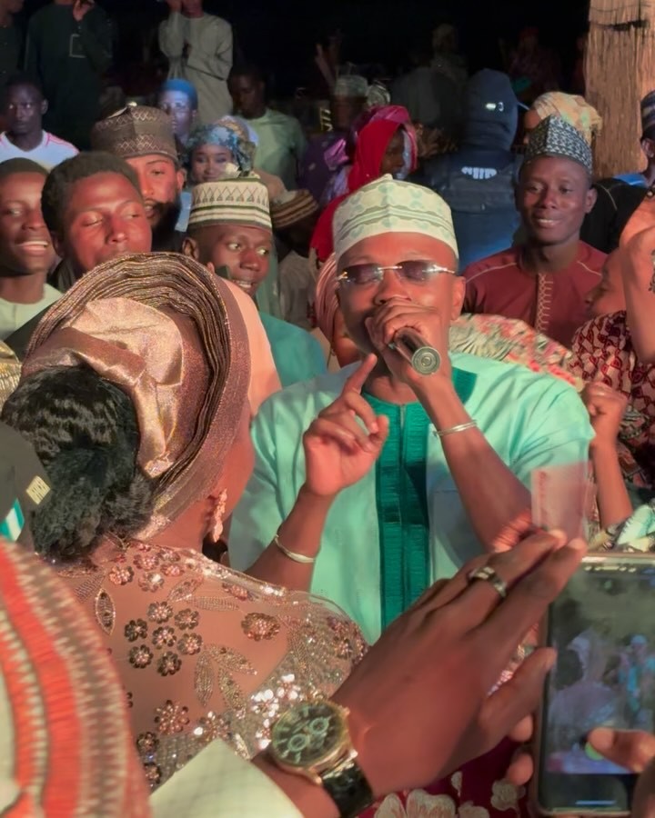 Namenj Love Songs in Hausa Music Namenj performing live on stage, with fans singing along