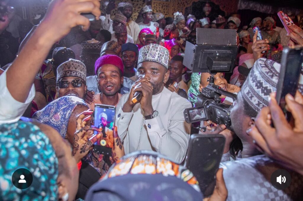 Hausa artist performing on stage